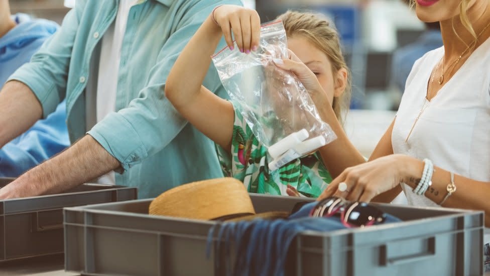 Family at airport security