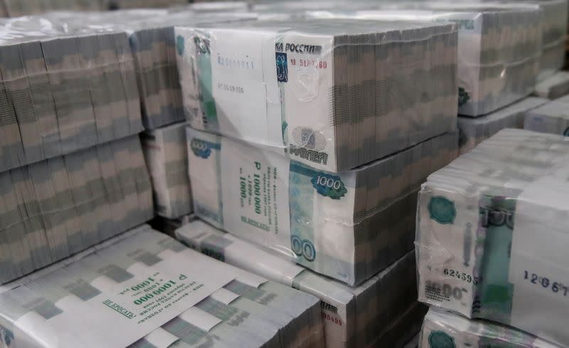 FILE PHOTO: Packs of 1000 Russian Roubles notes are pictured at Goznak printing factory in Moscow