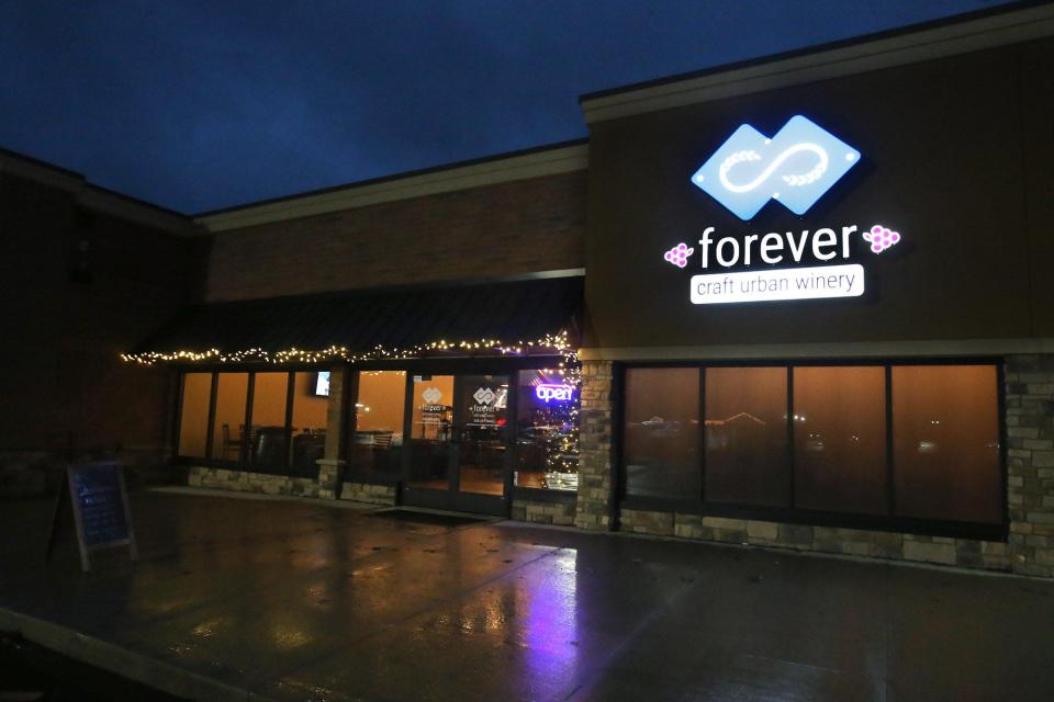 Melissa and Matt Smith have opened Forever Craft Urban Winery in Oakwood Square. Their business is shown in Plain Township on Thursday, Dec. 16, 2021.