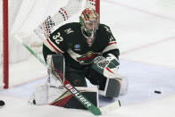 Minnesota Wild goaltender Filip Gustavsson (32) blocks the net during the first period of an NHL hockey game against the Chicago Blackhawks, Saturday, March 25, 2023, in St. Paul, Minn. (AP Photo/Stacy Bengs)