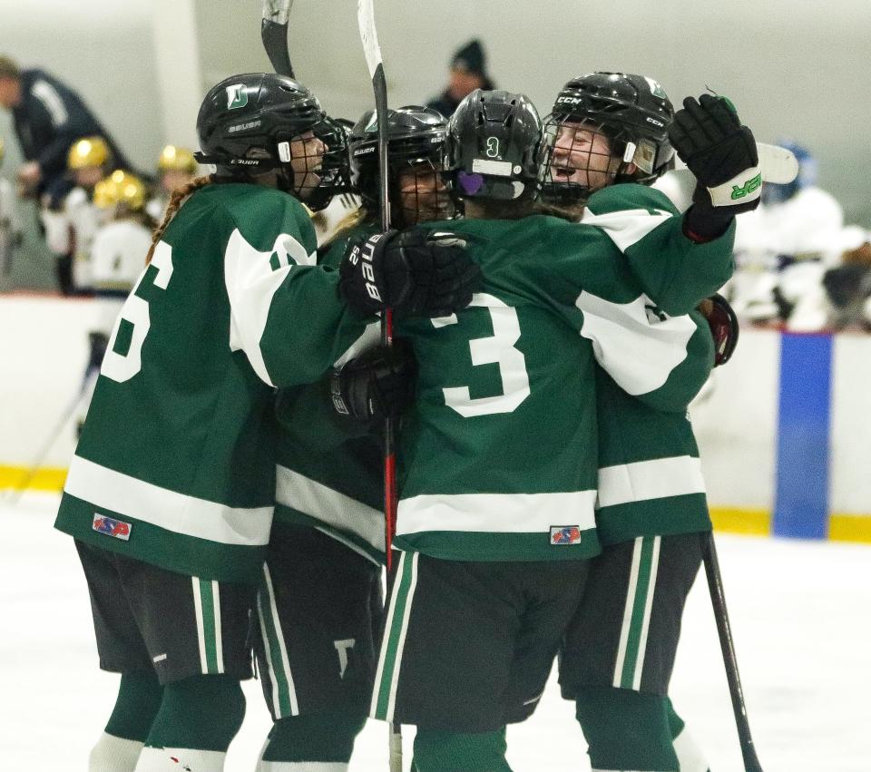 The Duxbury girls hockey team celebrated a goal during a game against Archbishop Williams at Canton Sportsplex on Saturday, Feb. 4, 2023.