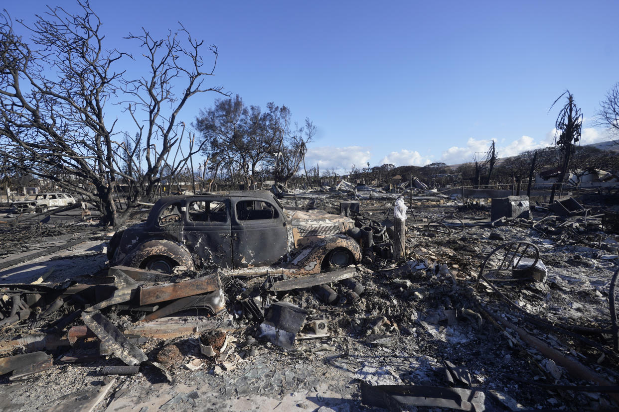 Wildfire damage is shown, Saturday, Aug. 12, 2023, in Lahaina, Hawaii. (AP Photo/Rick Bowmer)