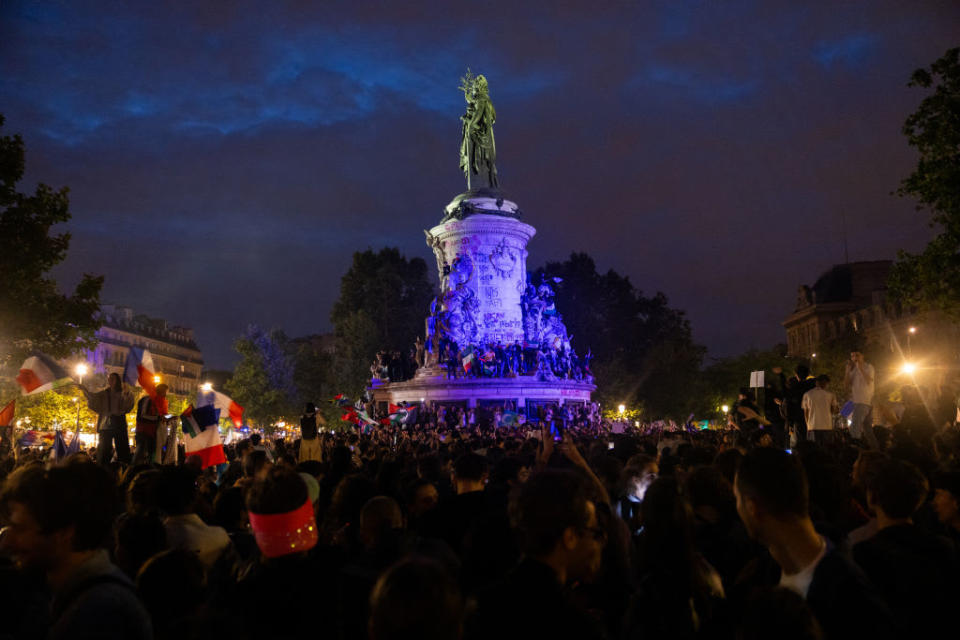 Supporters of the left wing union, the New Popular Front, gather at the Place de la Republique following the defeat of the far-right in France's legislative elections.