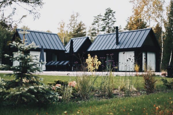 A family chose MyCabin to construct prefab structures in their home country of Latvia. The prefab structures have space for work, sleep, and relaxation.