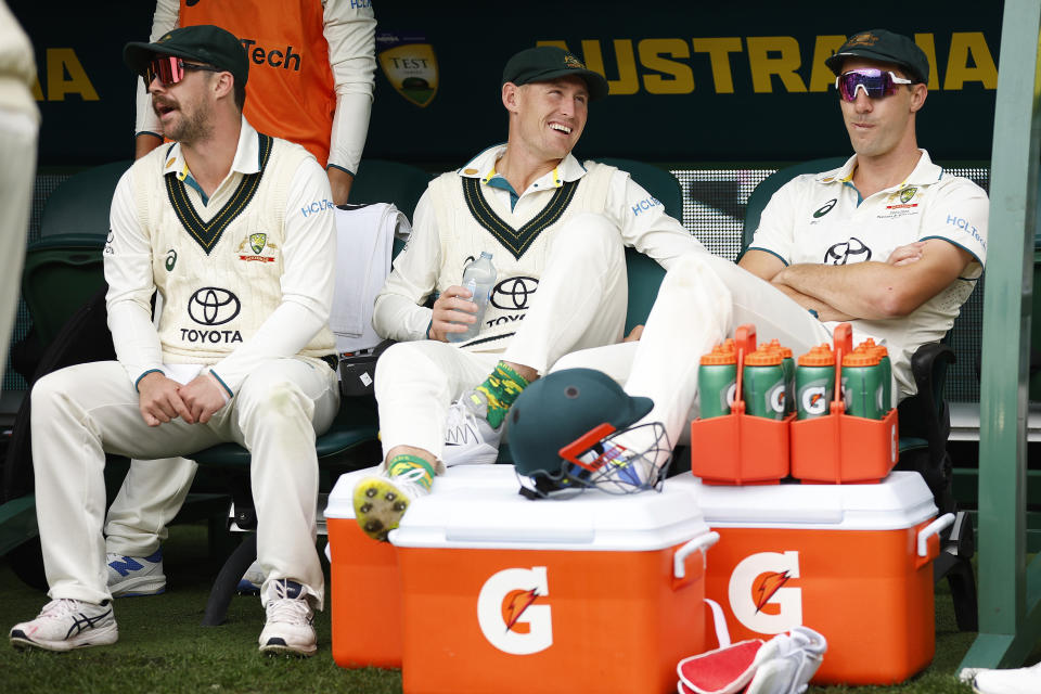 MELBOURNE, AUSTRALIA - DECEMBER 28:  Travis Head of Australia, Marnus Labuschagne of Australia (C) and Pat Cummins of Australia chat before day three of the Second Test Match between Australia and Pakistan at Melbourne Cricket Ground on December 28, 2023 in Melbourne, Australia. (Photo by Daniel Pockett - CA/Cricket Australia via Getty Images)