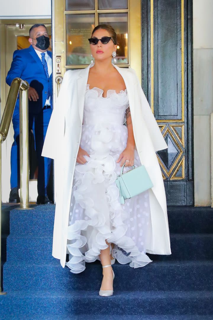 Lady Gaga seen wearing a white outfit as leaving her hotel in New York, July 1. - Credit: MEGA