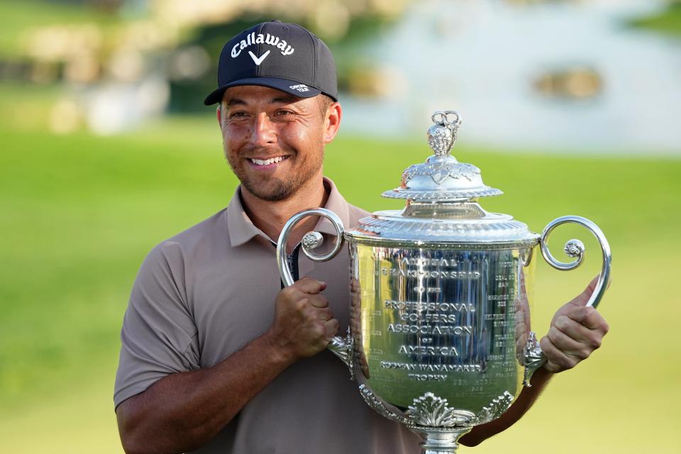 Xander Schauffele holds the Wanamaker Trophy after winning the PGA Championship on Sunday at Valhalla Golf Club.