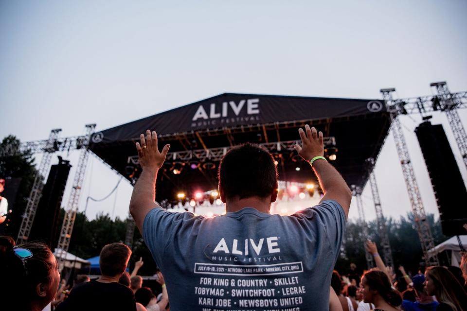 A fan is shown at last summer's Alive Music Festival at Atwood Lake Park. The event returns this week and runs Thursday through Sunday.