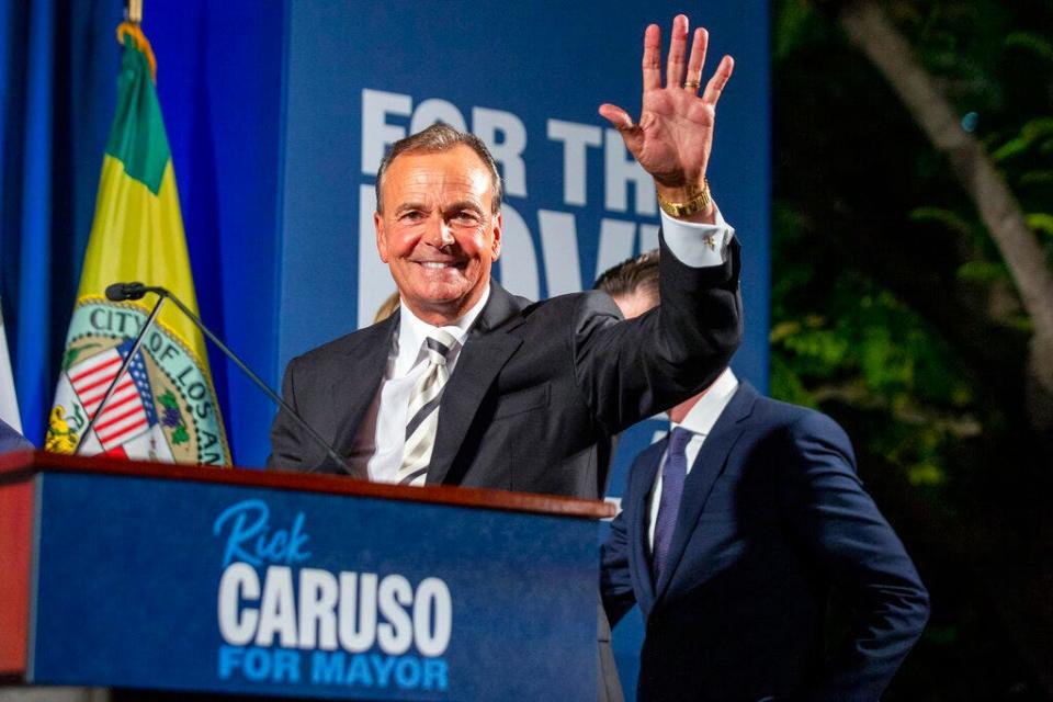 Rick Caruso, a Democratic candidate for mayor of Los Angeles, waves to supporters attending a primary election campaign event in Los Angeles, Tuesday, June 7, 2022.