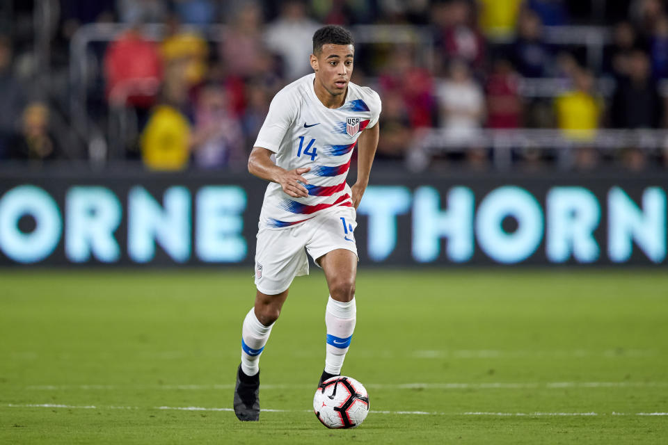 ORLANDO, FL - MARCH 21: United States midfielder Tyler Adams (14) dribbles the ball in game action during an International friendly match between the United States and the Ecuador men's national teams on March 21, 2019 at Orlando City Stadium in Orlando, FL. (Photo by Robin Alam/Icon Sportswire via Getty Images)