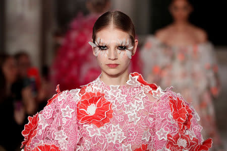 A model presents a creation by Italian designer Pier Paolo Piccioli as part of his Haute Couture Spring-Summer 2019 collection show for fashion house Valentino in Paris, France, January 23, 2019. REUTERS/Benoit Tessier