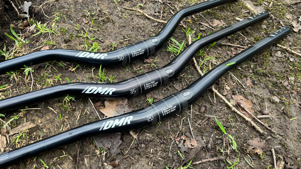  Three sets of MTB handlebars with different rises. 