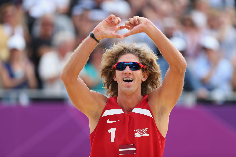 Aleksandrs Samoilovs of Latvia celebrates during the Men's Beach Volleyball match between Poland and Latvia on Day 1 of the London 2012 Olympic Games at the Horse Guards Parade on July 28, 2012 in London, England. (Getty Images)