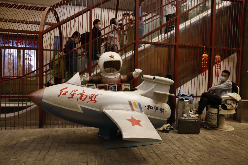 Shoppers visit a mall in Beijing on Friday, April 9, 2021. China’s economic growth surged to 18.3% over a year earlier in the first quarter of this year as factory and consumer activity recovered from the coronavirus pandemic. (AP Photo/Ng Han Guan)