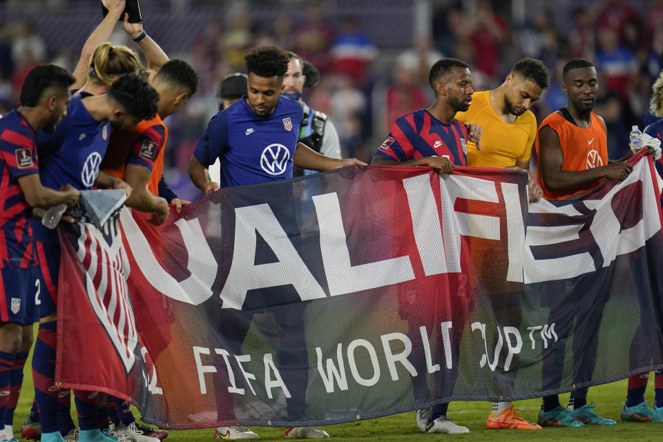 United States players celebrate after a FIFA World Cup qualifying soccer match against Panama, Sunday, March 27, 2022, in Orlando, Fla. The U.S. won 5-1. (AP Photo/Julio Cortez)