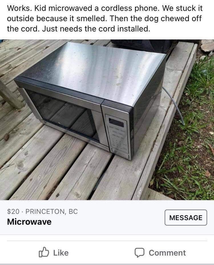 Microwave on wooden steps, door chewed by a dog, text states it's for sale, and the kid microwaved a phone
