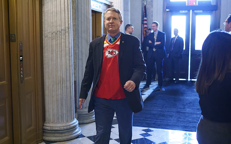 Sen. Roger Marshall (R-Kan.) arrives for a roll call vote in a Kansas City Chiefs shirt on Jan. 26. The Chiefs play the Cincinnati Bengals in the AFC championship game on Jan. 29. <em>Greg Nash</em>