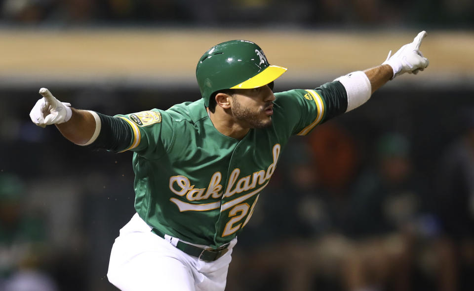 Oakland Athletics' rookie Ramon Laureano celebrates after his walk-off hit in his MLB debut. (AP)