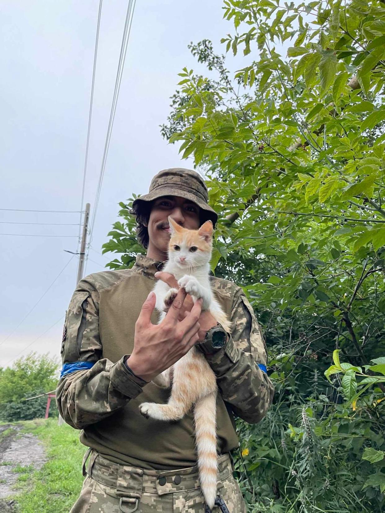 Austin Lathlin-Bercier loved taking care of the stray cats he encountered in Ukraine. (Lucy Lathlin/Supplied - image credit)