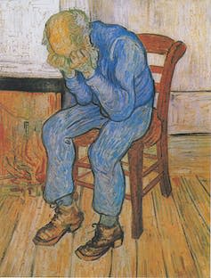 A painting of an old man in a blue suit sat in a wooden chat. His head is in his hands which reveals his bald head to the viewer.