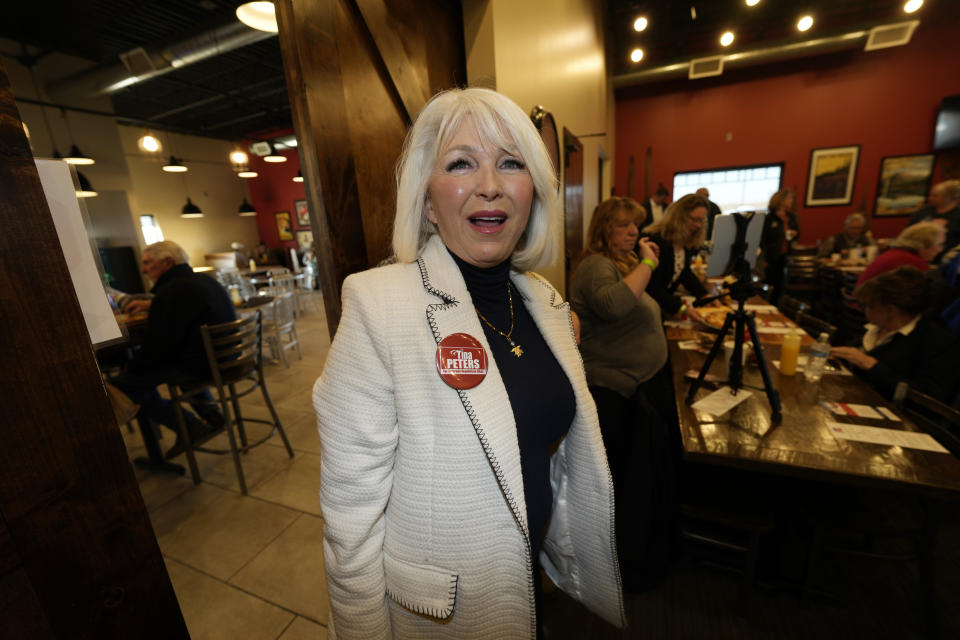 Candidate for the Colorado Republican Party chair position Tina Peters arrives for a debate for the state Republican Party leadership position sponsored by the Republican Women of Weld, Saturday, Feb. 25, 2023, in a pizza restaurant in Hudson, Colo. (AP Photo/David Zalubowski)