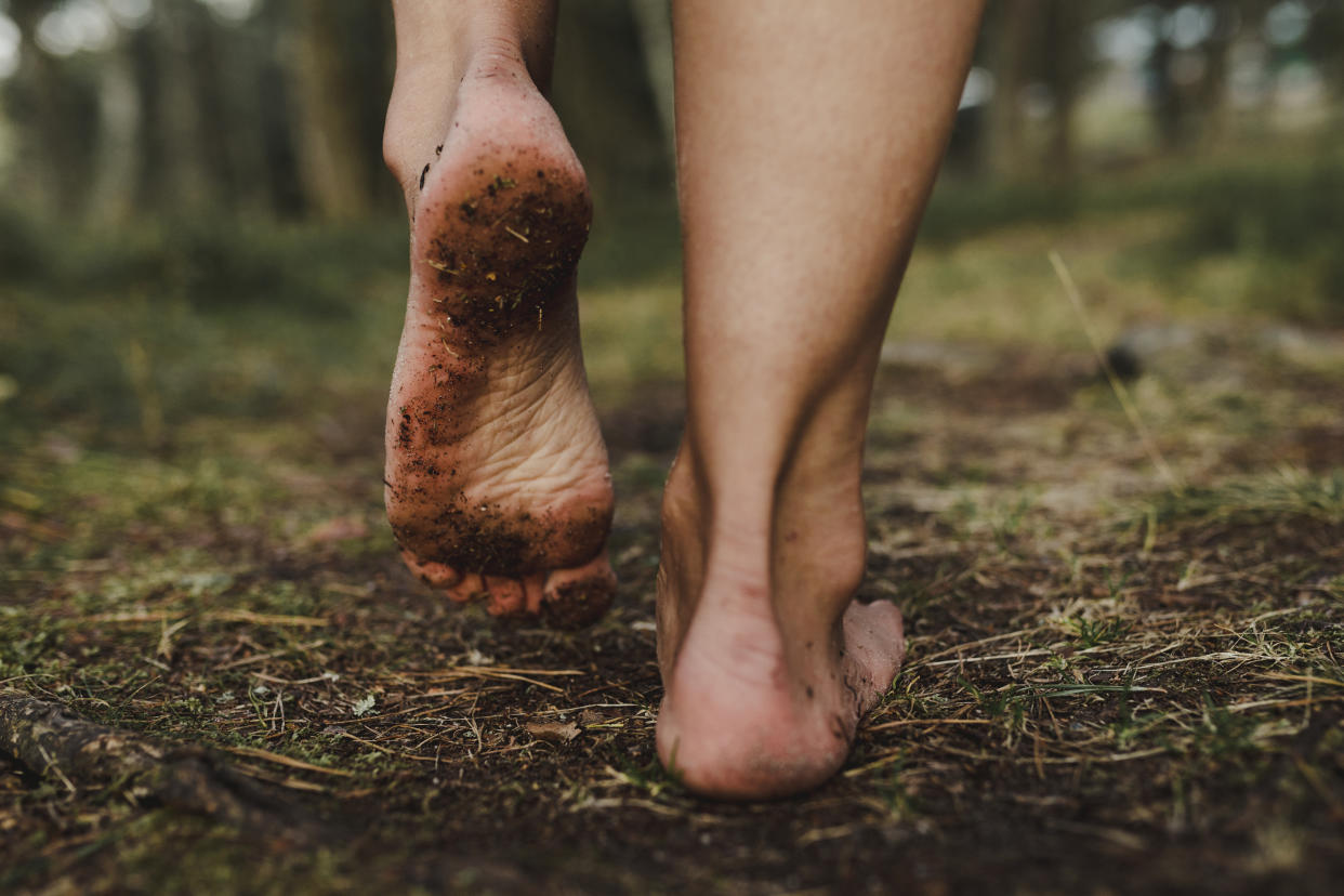 Bare feet on the ground