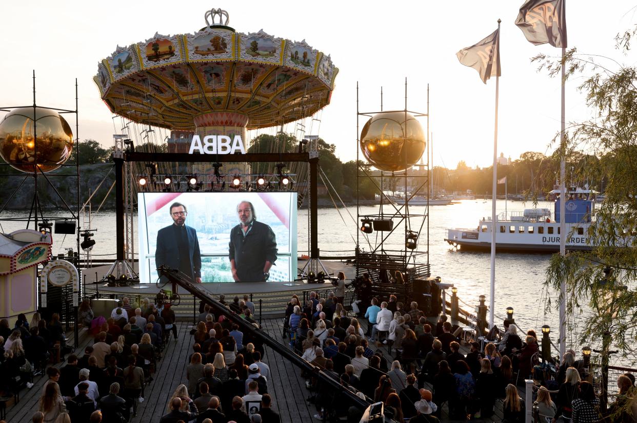 ABBA's Bjoern Ulvaeus and Benny Andersson are seen live on a display from London during their Voyage event at Grona Lund, Stockholm, on Sept. 2, 2021.T (Photo: Fredrik Persson/TT News Agency/AFP via Getty Images)