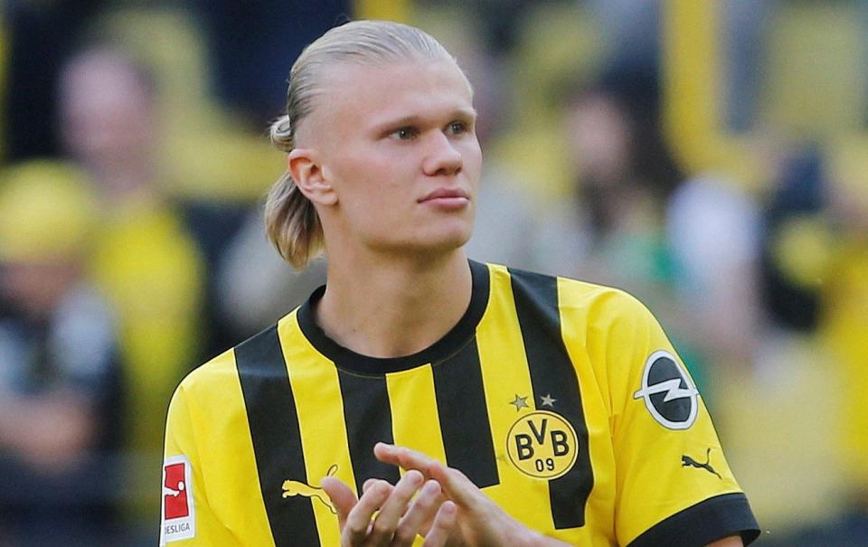 Borussia Dortmund's Erling Braut Haaland says goodbye to the fans after playing his last match - REUTERS
