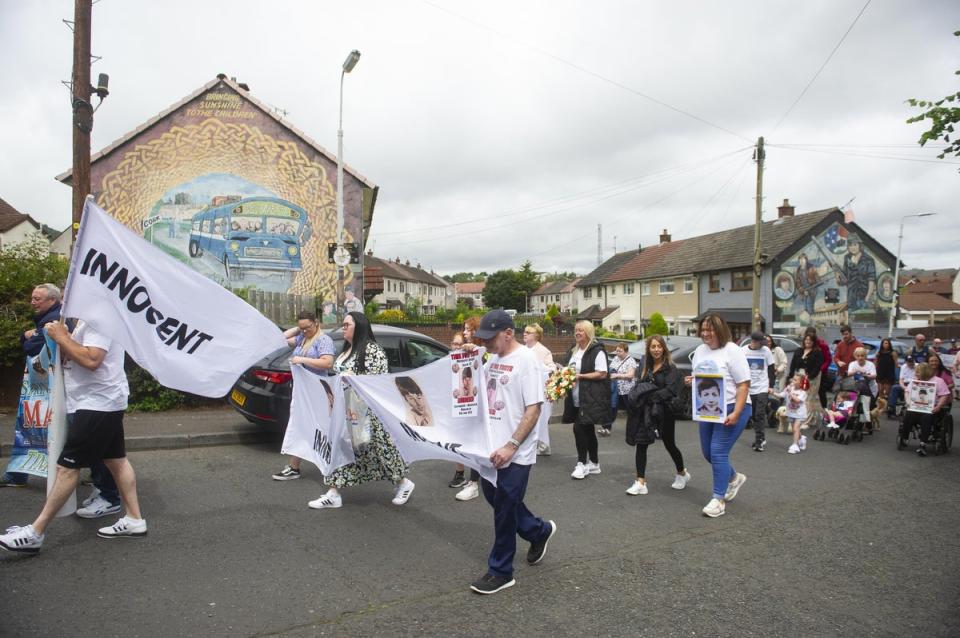 A march to mark the 50th anniversary of the shooting dead of five people in Springhill, west Belfast (Mark Marlow/PA) (PA Wire)