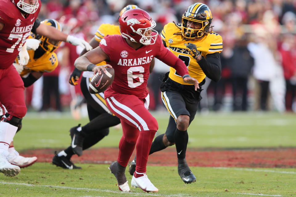 Nov 24, 2023; Fayetteville, Arkansas, USA; Arkansas Razorbacks quarterback Jacolby Criswell (6) looks to pass the ball during the first half against the <a class="link " href="https://sports.yahoo.com/ncaaw/teams/missouri/" data-i13n="sec:content-canvas;subsec:anchor_text;elm:context_link" data-ylk="slk:Missouri Tigers;sec:content-canvas;subsec:anchor_text;elm:context_link;itc:0">Missouri Tigers</a> at Donald W. Reynolds Razorback Stadium. Mandatory Credit: Nelson Chenault-USA TODAY Sports