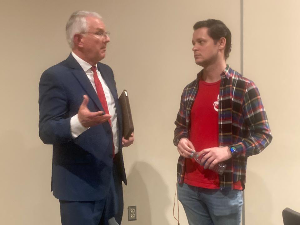 Ken Gilmore, a candidate for District 186 board of education in Subdistrict 4, talks to Lanphier High School science teacher Dalton McGhiey after Tuesday's "Meet the Candidates" forum sponsored by the Springfield Education Association. Gilmore faces incumbent Jeff Tucka and Donna Hopwood in the April 4 election.