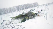 <p>In this screen grab provided by the Life.ru, the wreckage of a AN-148 plane is seen in Stepanovskoye village, about 40 kilometers (25 miles) from the Domodedovo airport, Russia on Feb. 11, 2018. (Photo: Life.ru via AP) </p>