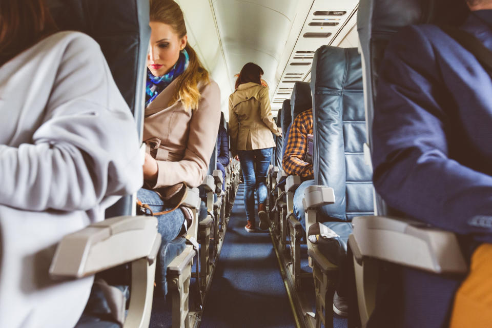 Experts recommend you make time to get up and move around during flights. Photo: Getty