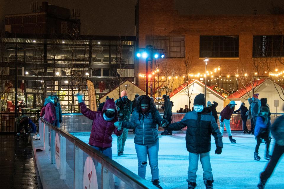 Skaters enjoy Louisville's only authentic outdoor ice rink during the Fete de Noel Winter Holiday Festival in Paristown on Saturday night. 12/19/20