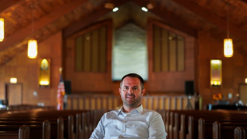 Pastor Ryan Burge, an associate professor of political science at Eastern Illinois University and author of "The Nones," poses for a portrait at at First Baptist Church in Mt. Vernon, Ill., Sept. 10, 2023.