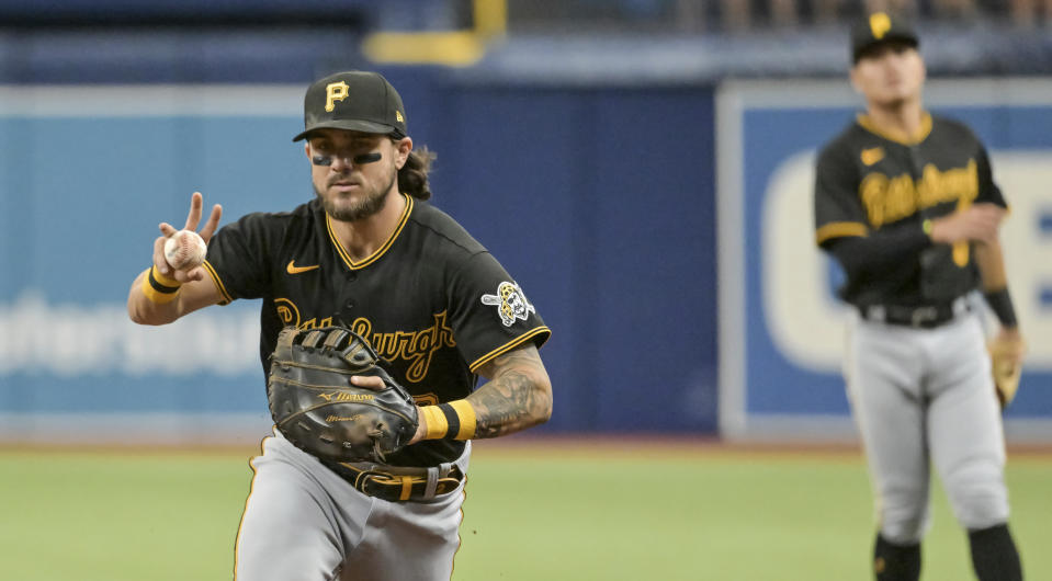 Pittsburgh Pirates first baseman Michael Chavis fields a ground ball hit by Tampa Bay Rays' Wander Franco during the first inning of a baseball game Sunday, June 26, 2022, in St. Petersburg, Fla. (AP Photo/Steve Nesius)