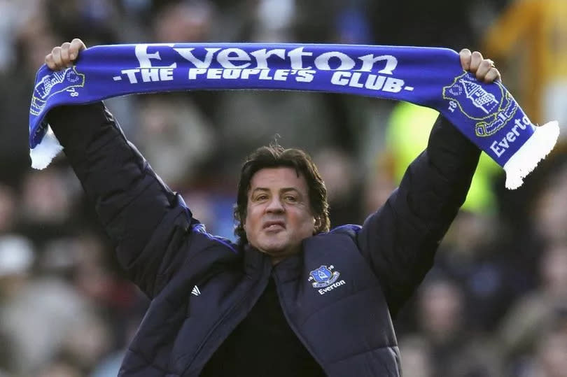 Hollywood Actor Sylvester Stallone salutes the fans with an Everton scarf prior to the start of the Barclays Premiership match between Everton and Reading at Goodison Park on January 14, 2007