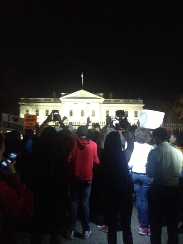 In this photo from Twitter user KatieACausey, people protest in Washington D.C. on Mon. Nov, 24, 2014. 