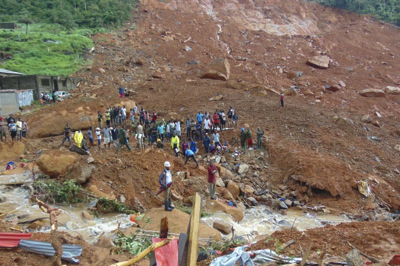 Residents view damage caused by a mudslide in the suburb of Regent behind Guma reservoir, Freetown, Sierra Leone, on August 14, 2017. File Photo by Ernest Henry/EPA