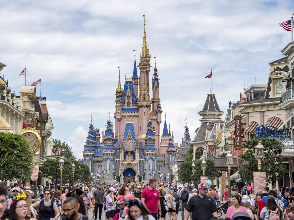 Crowds pack and fill Main Street USA at the Magic Kingdom Park at Walt Disney World in Orange County, Florida on June 1, 2022. Walt Disney World is celebrating its 50th anniversary all of 2022.