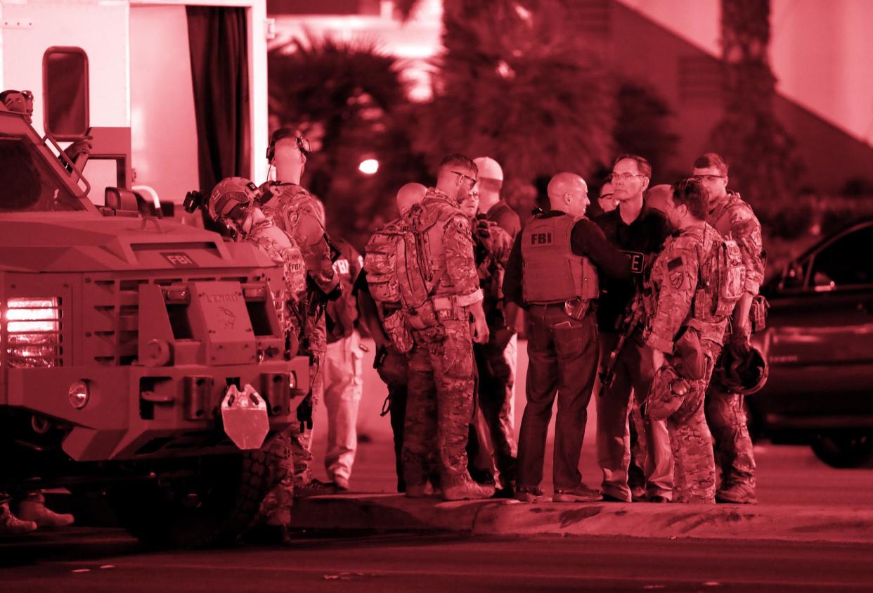 FBI agents confer in front of the Tropicana hotel-casino on October 2, 2017, after a mass shooting during a music festival on the Las Vegas Strip in Las Vegas, Nevada: REUTERS/Las Vegas Sun/Steve Marcus