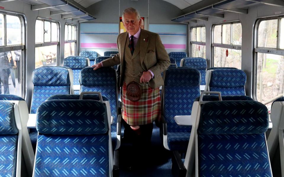 Prince Charles views the inside of the restored carriages that were vandalised in August 2015 - Credit: Andrew Milligan/PA