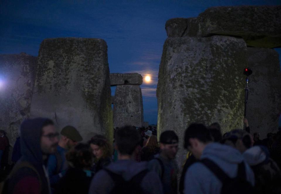 Revellers celebrate the longest day of the year at under a ‘strawberry’ moon at Stonehenge on Salisbury Plain in southern England, Britain June 20, 2016.  REUTERS/Kieran Doherty