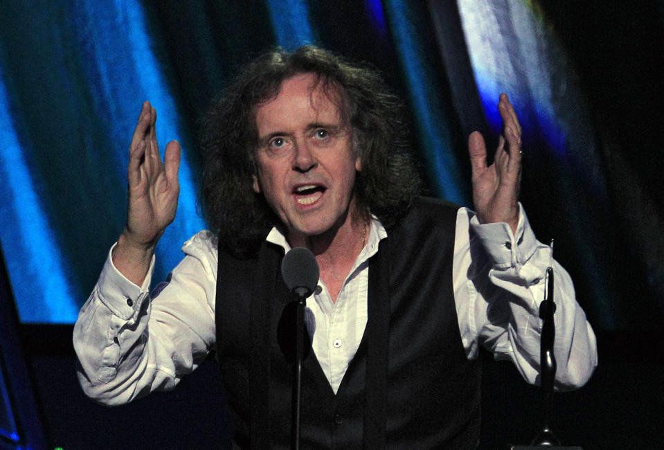Donovan Leitch accepts induction into the Rock and Roll Hall of Fame Saturday, April 14, 2012, in Cleveland. (AP Photo/Tony Dejak)