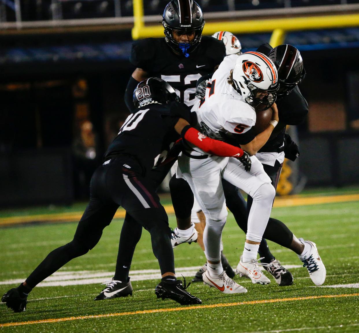 Republic's Wyatt Woods (5) carries the ball as they take on the Cardinal Ritter Lions in the Class 5 State Championship football game at Faurot Field in Columbia, Mo. on Friday, Dec. 1, 2023.