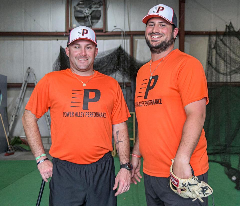 Jerod Mathis, left, and Thomas Prescott are co-owners of Power Alley Performance, which opened Monday in Leesburg. [PAUL RYAN / CORRESPONDENT]