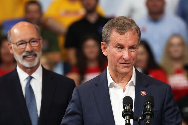 Cartwright (right) speaks before President Joe Biden takes the stage in Wilkes-Barre in late August. Pennsylvania Gov. Tom Wolf (left) looks on. (Photo: Michael M. Santiago via Getty Images)