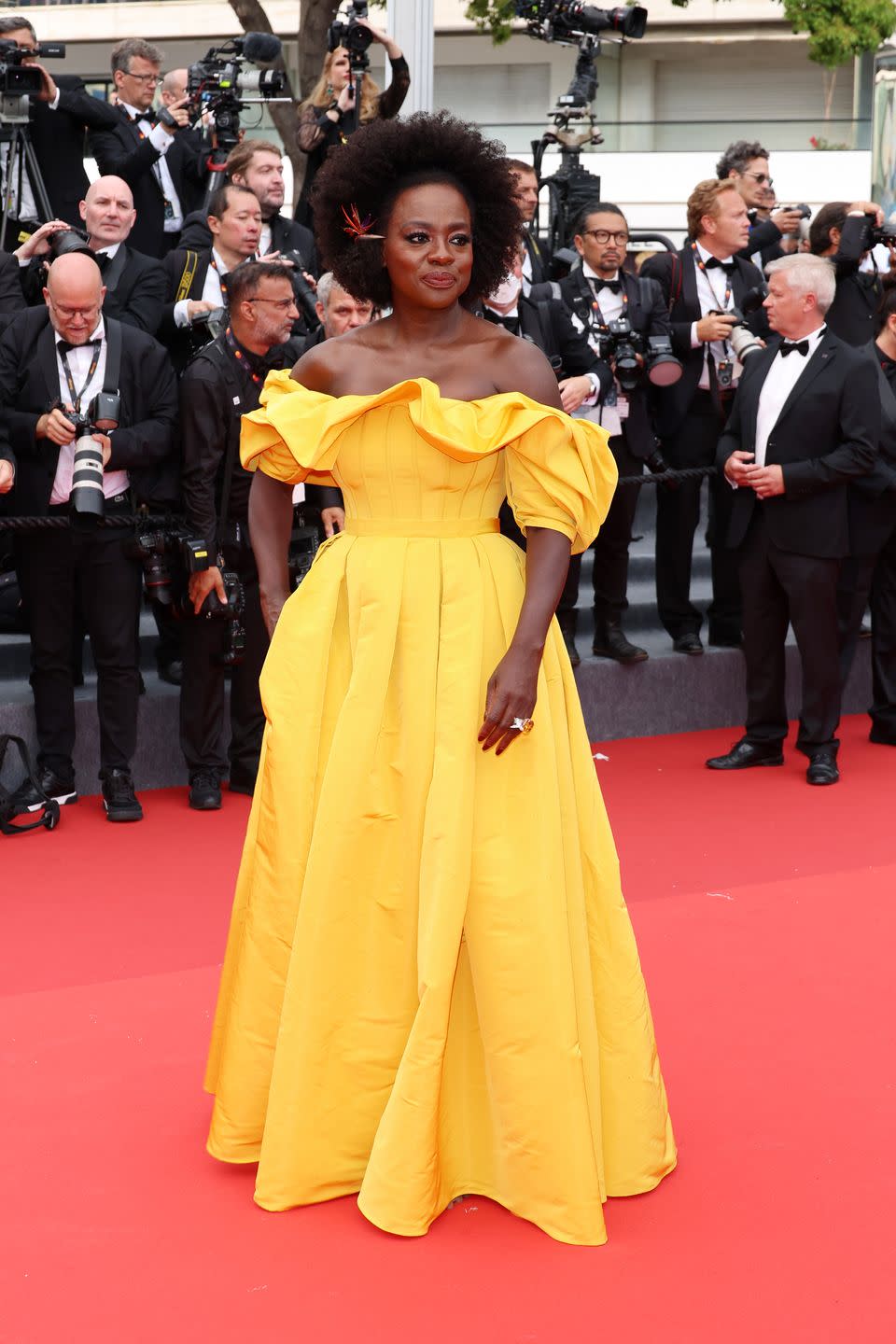<p>Viola Davis brought the brights to the Cannes Film Festival this year, both with this sunshine-yellow Alexander McQueen gown and a number of other <a href="https://www.harpersbazaar.com/uk/fashion/g36943036/cannes-red-carpet-fashion/" rel="nofollow noopener" target="_blank" data-ylk="slk:block-colour looks" class="link ">block-colour looks</a> that she wore during her time in Cannes. The actress attended the Top Gun: Maverick premiere in this corseted off-the-shoulder dress which featured a ruffled neckline and full taffeta skirt, and finished her look with some <a href="https://www.harpersbazaar.com/uk/fashion/jewellery-watches/g36967815/cannes-jewellery/" rel="nofollow noopener" target="_blank" data-ylk="slk:equally colourful Boucheron jewellery" class="link ">equally colourful Boucheron jewellery</a>.</p>