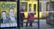 In this picture taken on Tuesday, Oct. 8, 2019, electoral posters are displayed at a tram stop in Budapest, Hungary. Budapest Mayor Istvan Tarlos is running for a third term and his main challenger is Gergely Karacsony, who is backed by several left-wing, liberal and green parties. Hungary will hold nationwide municipal elections on Oct. 13. (AP Photo/Pablo Gorondi)