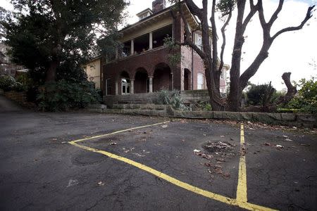 A car space (front) that was sold at auction earlier this month for A$120,000 (US$92,000), can be seen in the inner-Sydney suburb of Kirribilli, Australia June 23, 2015. REUTERS/David Gray